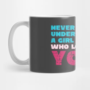 Never underestimate a girl who loves yoga Mug